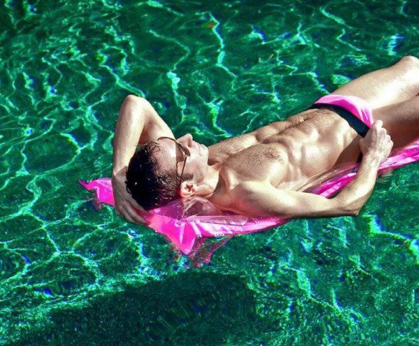 gorgeous hunk in the swimming pool