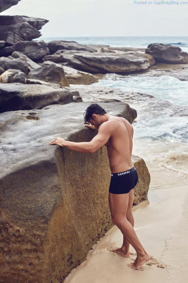 handsome male model at the beach