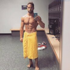 muscle man selfie in locker room towel