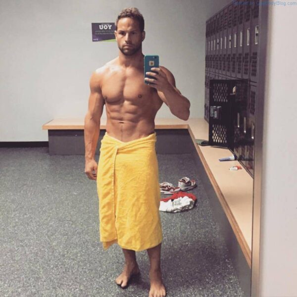 muscle man selfie in locker room towel