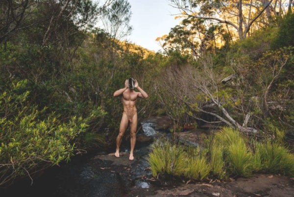 handsome naked man outdoors