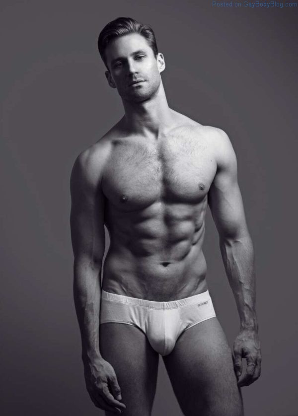 Nicholas Cunningham standing and wearing tight white underwear