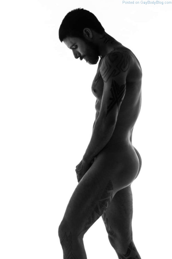 Lucas Santarelli naked in a black and white photo