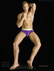 Male model Kevin Selby in purple underwear