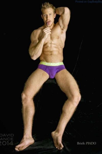 Male model Kevin Selby in purple underwear