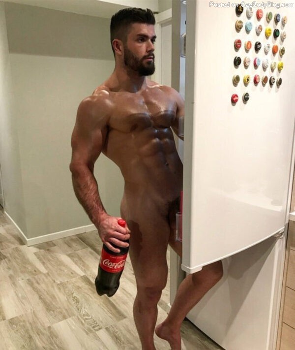 Getting a snack from he fridge with naked Fabien Sassier