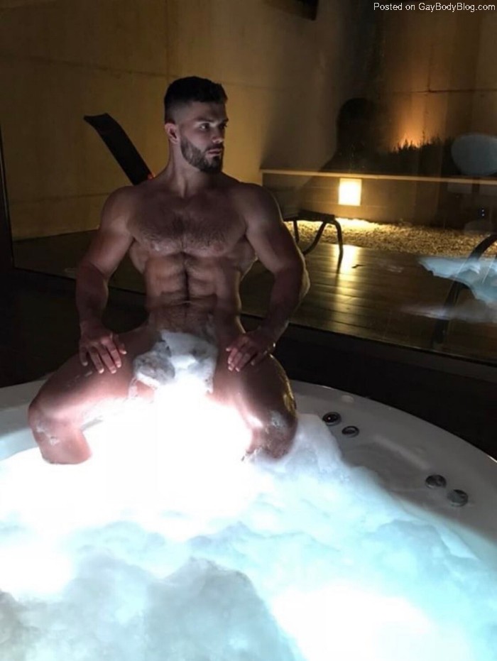 we would all enjoy some time in the hot tub with this big naked stud