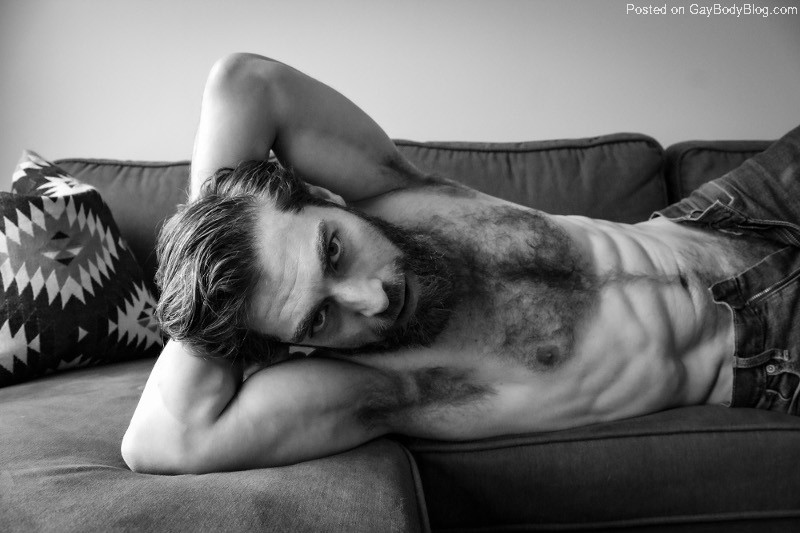 Hairy daddy on a couch shirtless