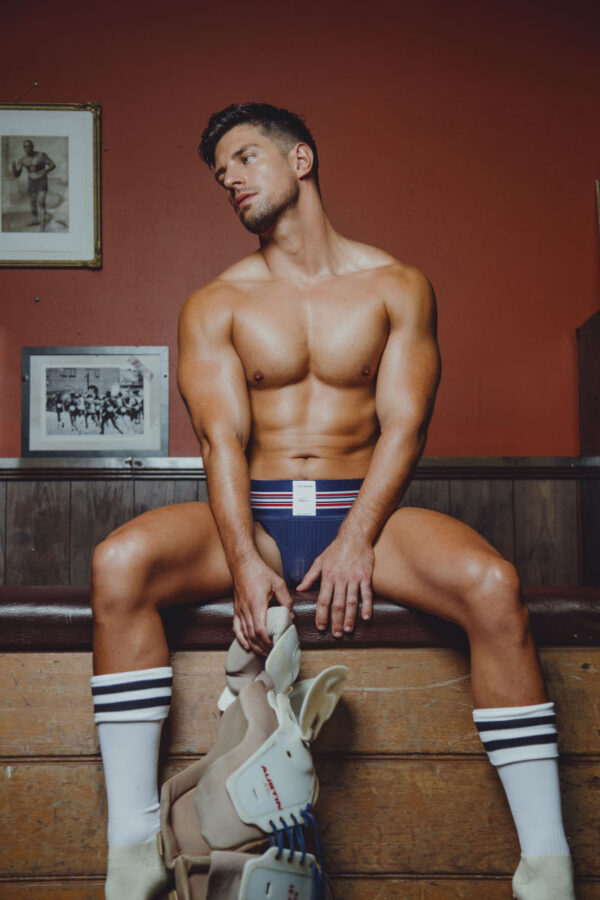 Handsome Ryan Greasley in the locker room for TEAMM8