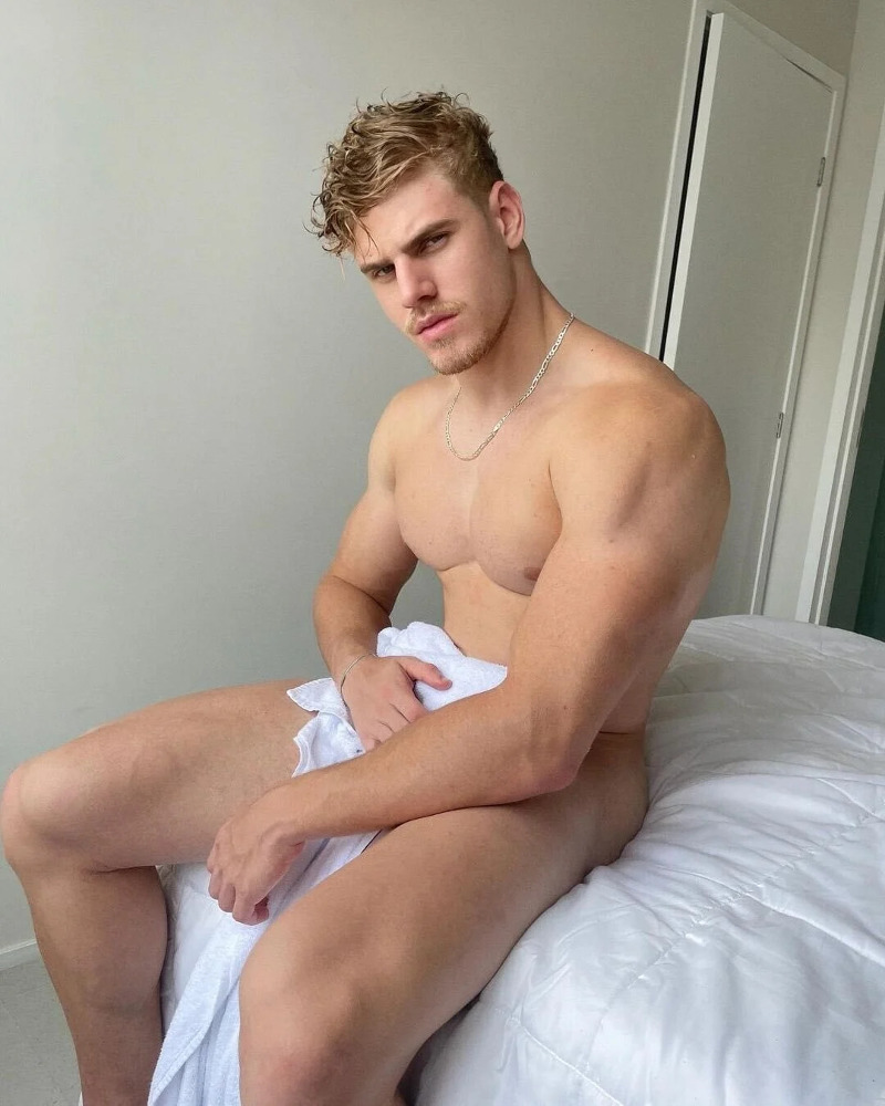 blue eyed stud Arthur Becari naked on the bed