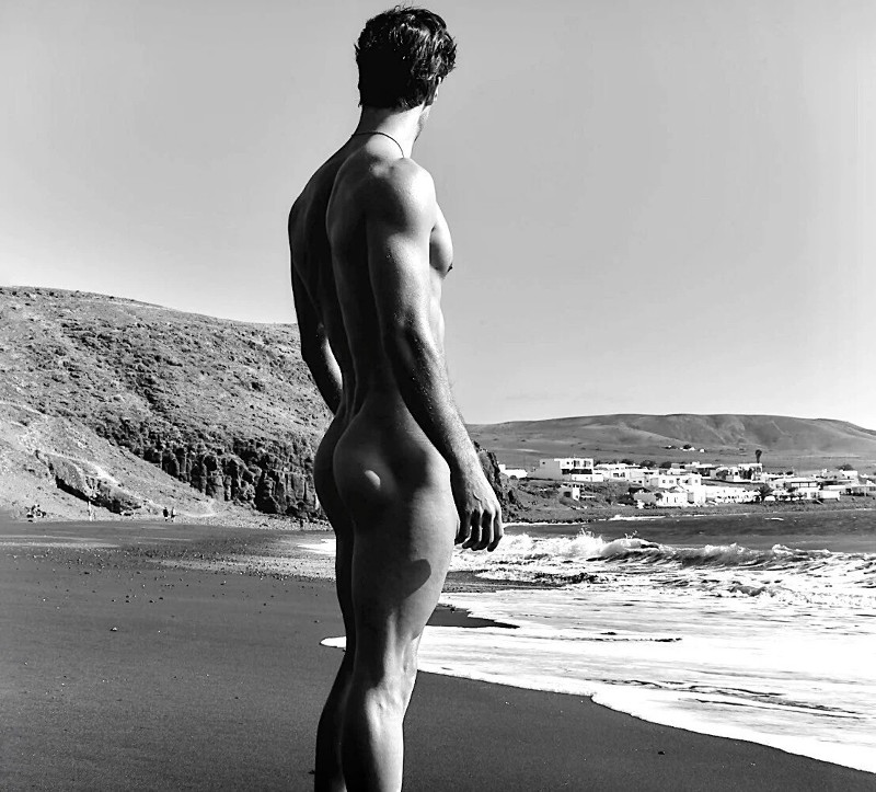 male model on a nude beach