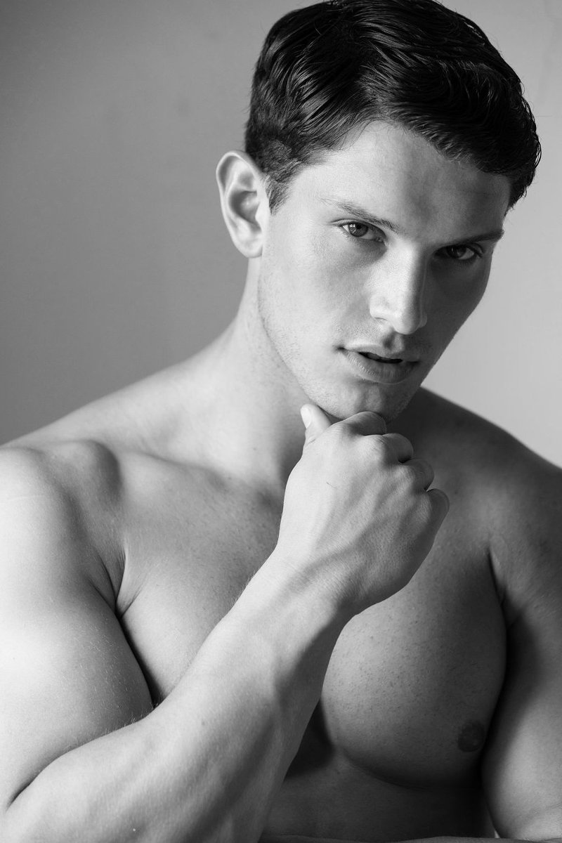 Shirtless black and white portrait photo British male model Josh Ivory