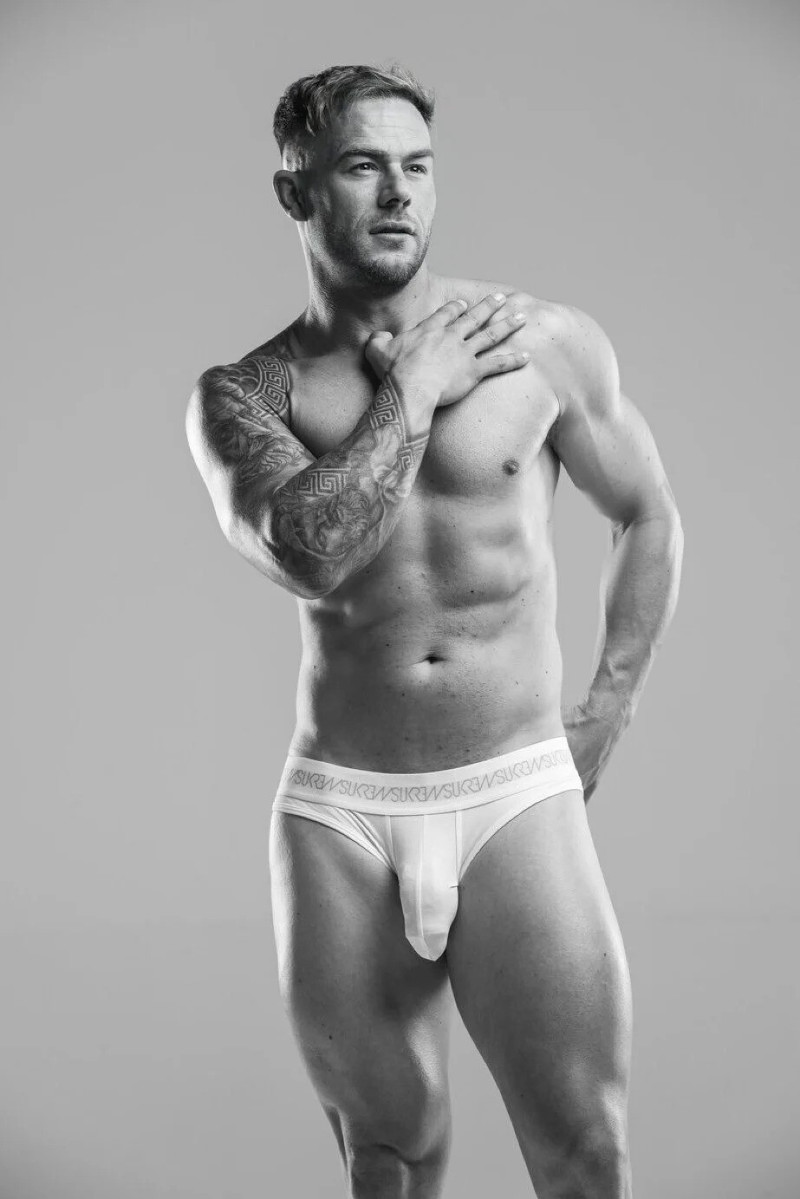 Hung British model Dean Dancer showing off his big package in some very snug white briefs