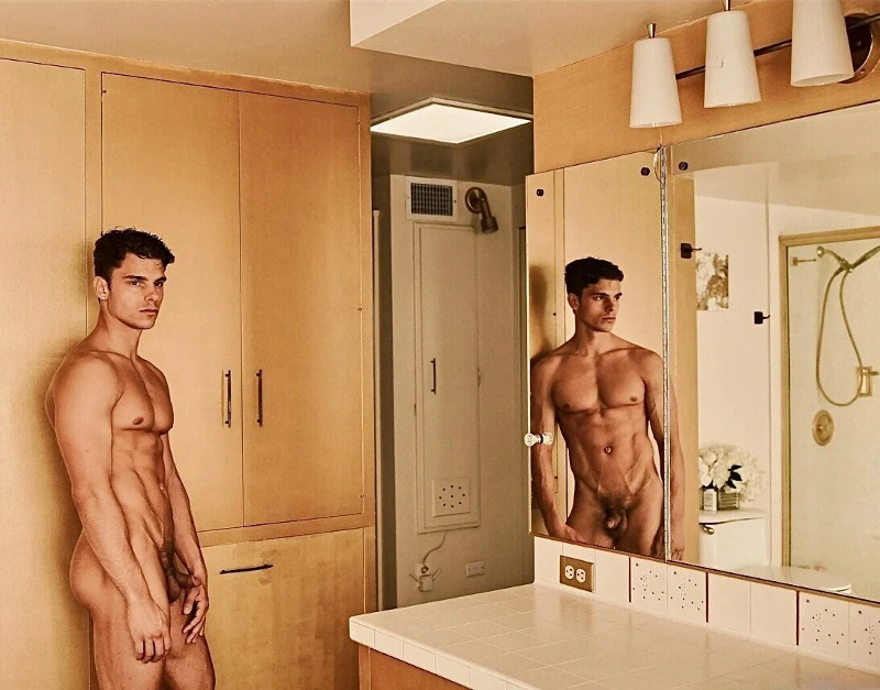 male model Nik Ball naked in a bathroom